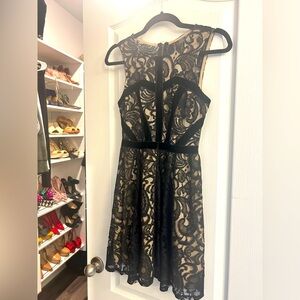 Black lace & nude cocktail dress.
no rips/ tears smoke free home. No returns.